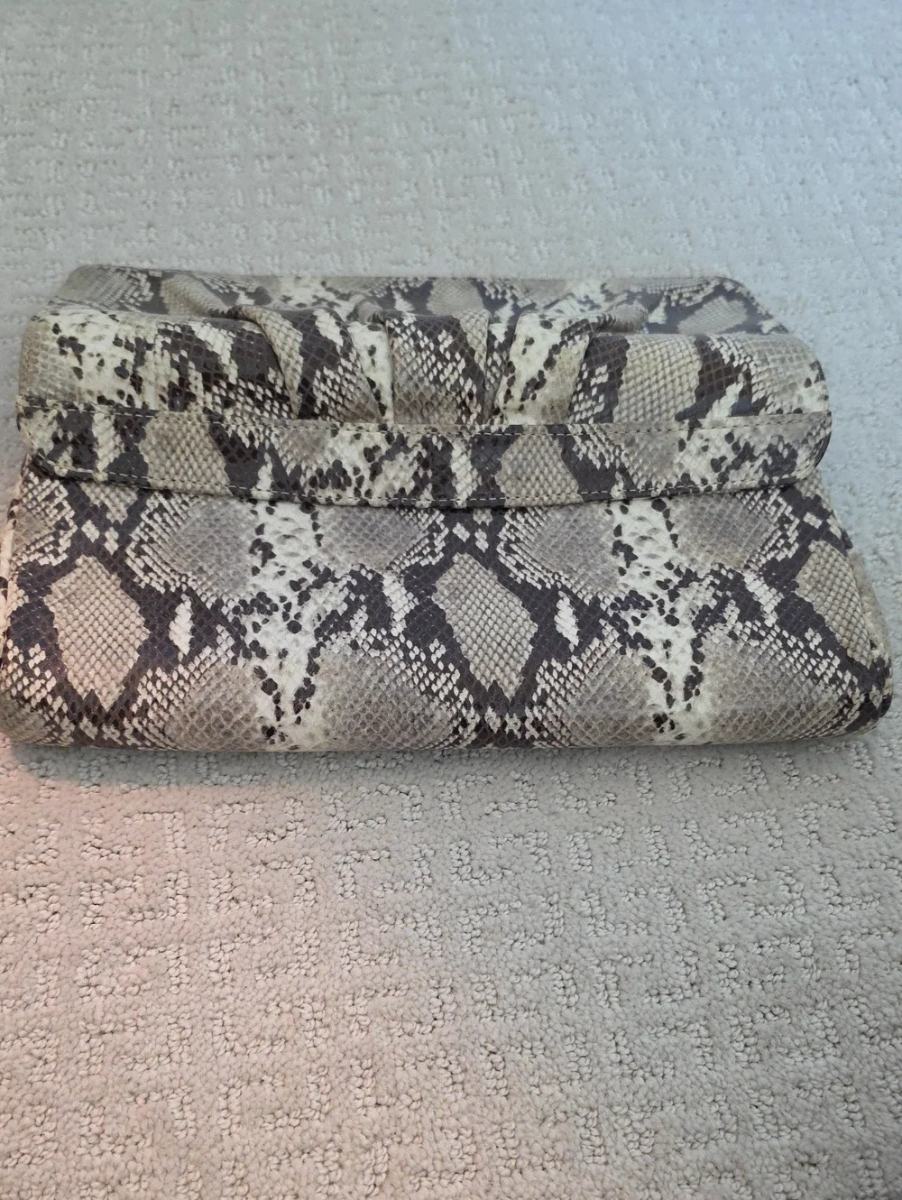 Lauren Merkin sophisticated snake